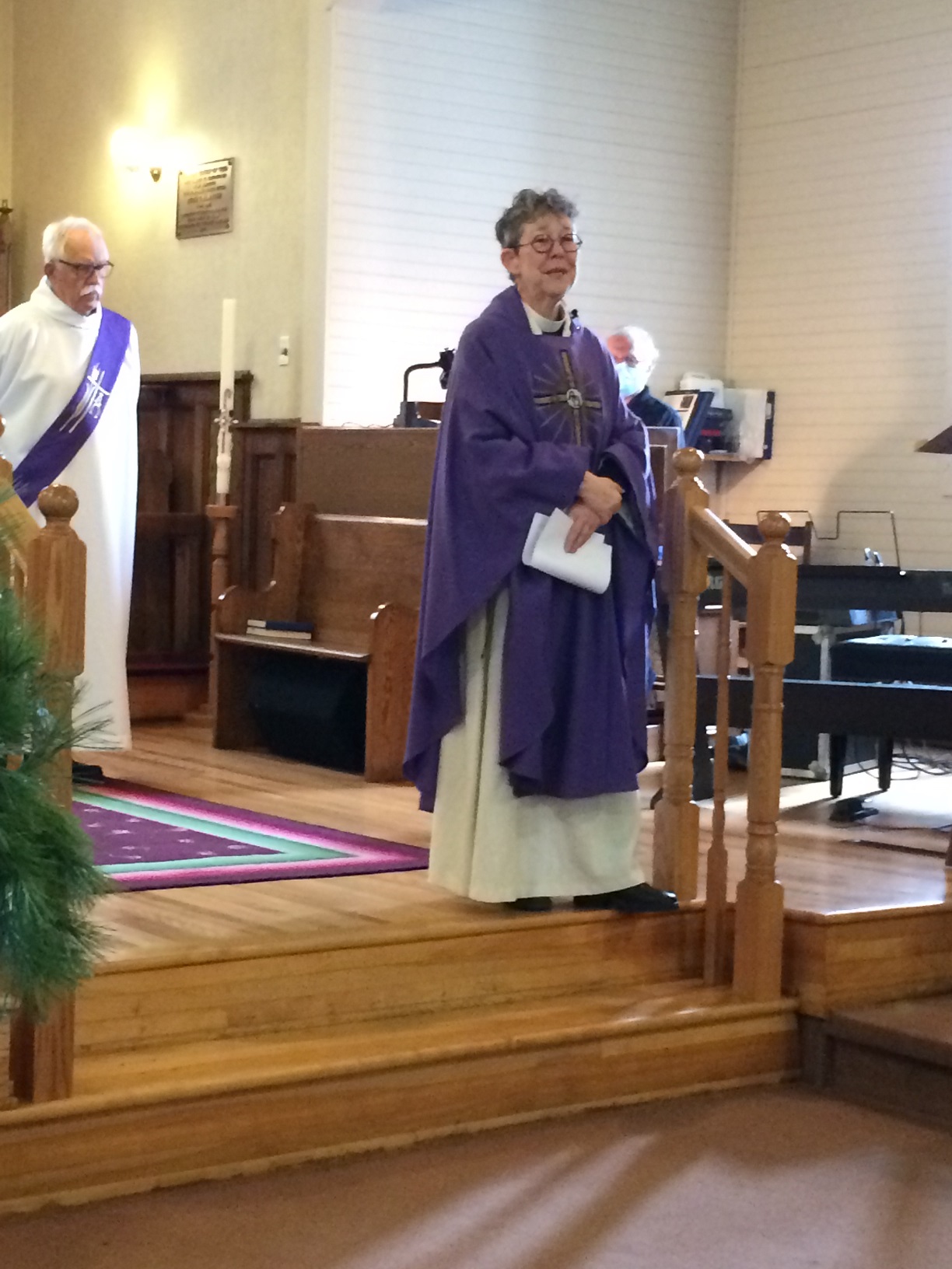 Rev. Ann blesses items collected for the Mission to Seafarers